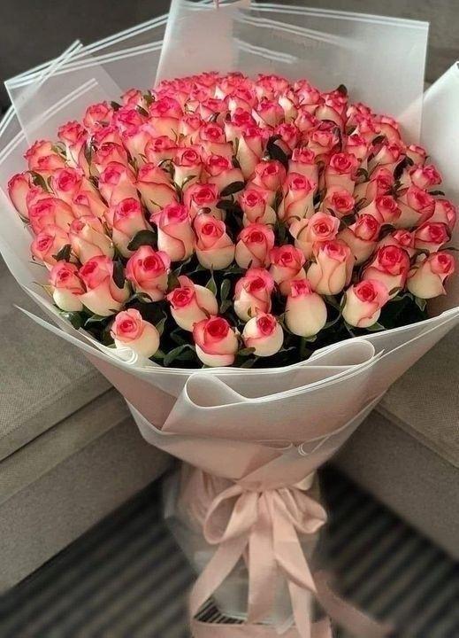 Professional floral arrangement in modern corporate setting